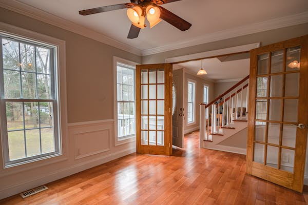 A residential floor installed with engineered vinyl planks.