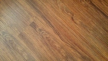 A surface of premium engineered vinyl flooring.