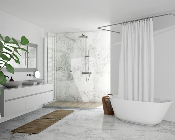 A white-colored bathroom flooring which makes it look spacious.