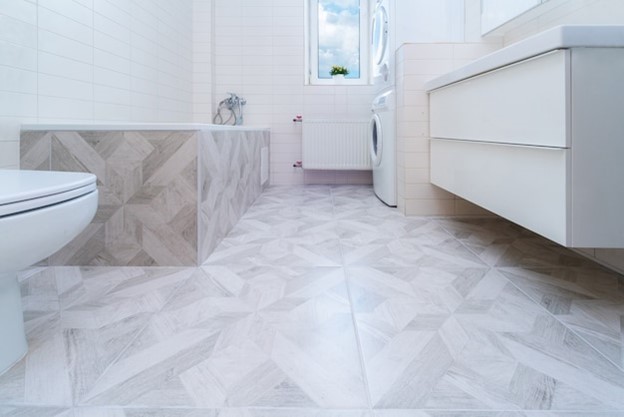 White patterned vinyl in bathroom installed